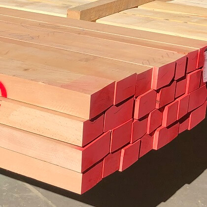 Kiln-dried beech wood, stacked and ready for export